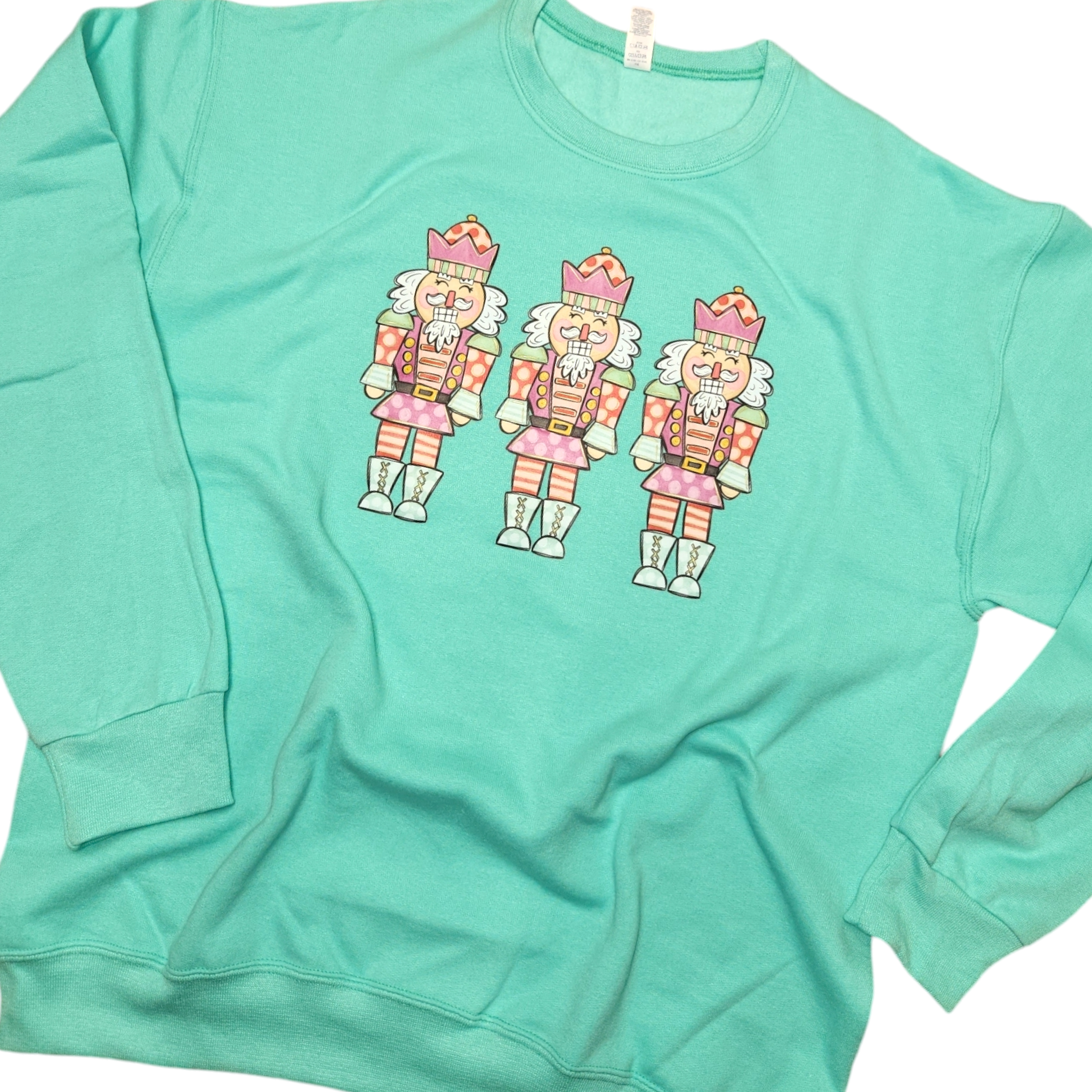 Colorful Nutcracker Trio Sweatshirt - Cool Mint - Plus/Regular-Graphic Sweatshirt-LouisGeorge Boutique-LouisGeorge Boutique, Women’s Fashion Boutique Located in Trussville, Alabama